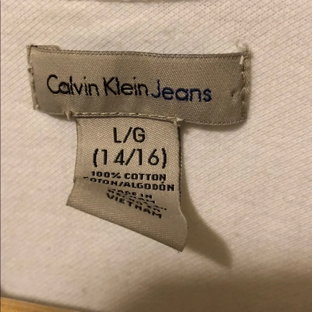 White Calvin‎ Klein kids short sleeve polo size LG